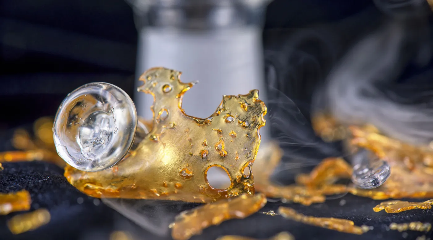 Cannabis concentrate with glass dab tool